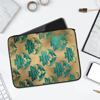 Infidu Beige Floral Design Laptop Sleeve with blue and teal flowers on a beige background. laptop sleeve kept on a plain white background