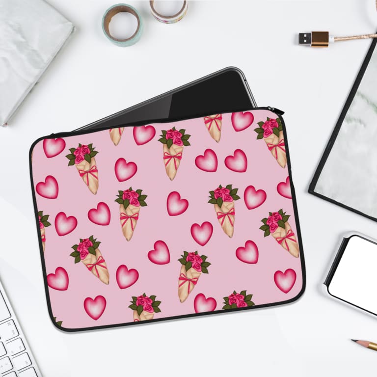 Infidu Romantic Heart & Floral Print Laptop Sleeve with pink hearts and flower bouquets on a white background. laptop sleeve kept on a plain white background