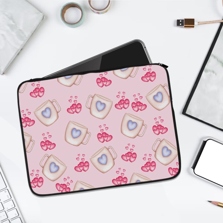 Infidu Light Pink Laptop Sleeve with Mug & Heart Print Design featuring small mugs with blue hearts and pink heart prints. laptop sleeve kept on a plain white background