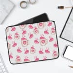 Infidu Cute Pink Heart Print Laptop Sleeve with pink heart pattern on white background, perfect for stylish laptop protection. laptop sleeve kept on a plain white background