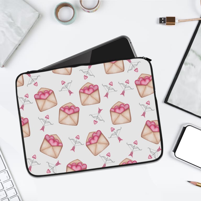 Infidu Cute Pink Envelope & Heart Laptop Sleeve with a white background and pink envelopes containing hearts, offering a playful and romantic design. laptop sleeve kept on a plain white background