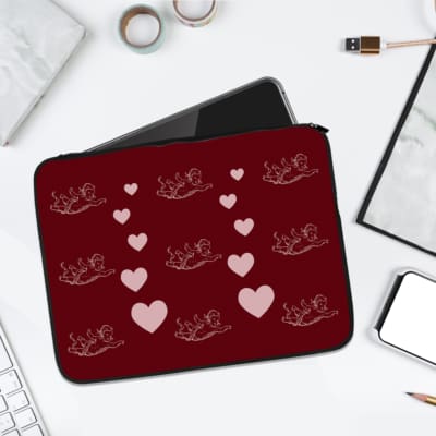 Infidu Maroon Heart & Angel Pattern Laptop Sleeve with white hearts and angel figures on a maroon background. laptop sleeve kept on a plain white background