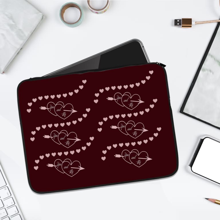 Infidu Maroon Laptop Sleeve with Heart & Wave Pattern design, featuring hearts and dotted wave lines in light colors against a maroon background. laptop sleeve kept on a plain white background