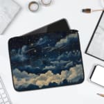 Infidu laptop sleeve with dreamy night sky design, featuring clouds and stars in dark blue and white tones. laptop sleeve kept on a plain white background