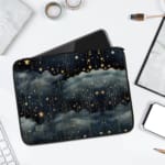 Rainy night sky laptop sleeve with stars, clouds, and a dark blue background. laptop sleeve kept on a plain white background