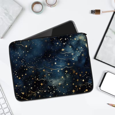 Laptop sleeve with a galaxy-inspired design featuring dark blue, black, stars, and wave-like patterns for a cosmic look. laptop sleeve kept on a plain white background