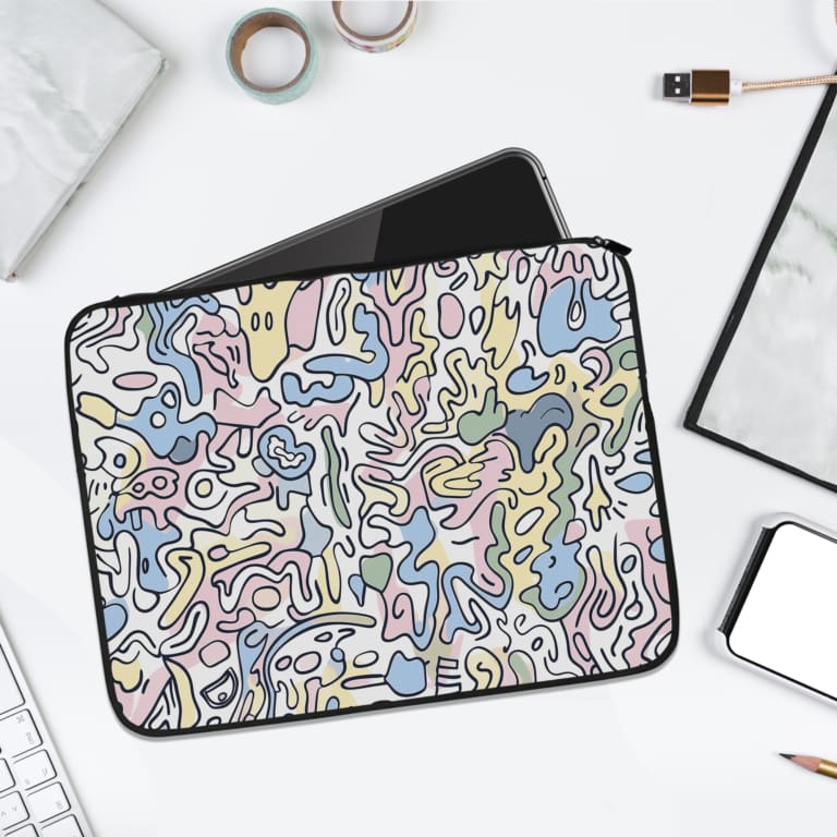 Abstract blue and purple flowing design laptop sleeve with a white background, featuring modern, organic shapes. laptop sleeve kept on a plain white background