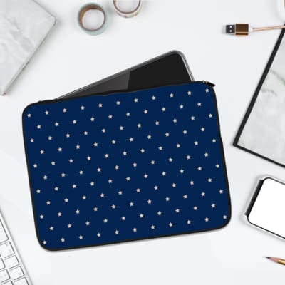 Dark Blue laptop sleeve with white polka dots, creating a classic and playful design. laptop sleeve kept on a plain white background