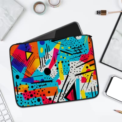 Infidu Vibrant Abstract Laptop Sleeve featuring bold colors like blue, orange, yellow, pink, and purple with geometric shapes and lines.laptop sleeve kept on a plain white background