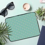 Infidu Light Blue Laptop Sleeve with Gold Heart Pattern – Simple and stylish design to protect your laptop. the laptop sleeve on the table