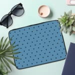 Infidu Simple Blue Polka Dot Laptop Sleeve – Stylish and Durable the laptop sleeve on the table