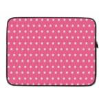 Light Pink laptop sleeve with a repeating white star pattern, shown against a bright background. laptop sleeve kept on a plain white background