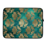 Elegant floral teal-blue laptop sleeve with beige and gold flowers, offering stylish protection for your laptop. laptop sleeve kept on a plain white background