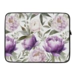 Elegant floral laptop sleeve with purple flowers and green leaves on a soft, light background. laptop sleeve kept on a plain white background