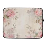 Elegant soft pink floral vintage laptop sleeve with light pink roses and green leaves on a pale background, designed for laptop protection. laptop sleeve kept on a plain white background