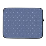 Simple blue laptop sleeve with white polka dots for a clean and stylish design. laptop sleeve kept on a plain white background