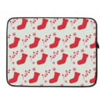 Infidu Christmas laptop sleeve with red stockings and holly berries on a white background, adding a festive touch for the holidays. laptop sleeve kept on a plain white background