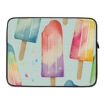 Laptop sleeve with pastel-colored popsicle design in blue, pink, purple, and peach on a light background with zip closure. laptop sleeve kept on a plain white background