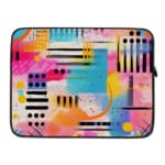 Infidu Bold Abstract Laptop Sleeve featuring bright geometric patterns in pink, blue, yellow, black, and white with a secure zip closure. laptop sleeve kept on a plain white background