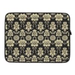 Black laptop sleeve with white floral pattern, detailed and symmetrical, for a bold and classic look. laptop sleeve kept on a plain white background