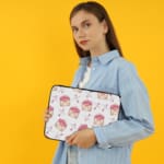 Infidu Cute Pink Envelope & Heart Laptop Sleeve with a white background and pink envelopes containing hearts, offering a playful and romantic design. the person holding the sleeve