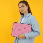 Infidu Light Pink Heart Outline Laptop Sleeve -Delicate Laptop Protection the person holding the sleeve