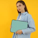 Infidu Light Blue Laptop Sleeve with White Star Pattern – Simple and stylish design to protect your laptop. the person holding the sleeve