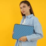 Infidu Simple Blue Polka Dot Laptop Sleeve – Stylish and Durable for the Person Holding the Sleeve