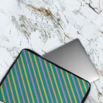 Infidu Colorful Striped Diagonal Lines Laptop Sleeve in green, blue, yellow, and pink. The laptop sleeve covers the laptop