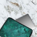 Infidu Dark Textured Teal-Green Laptop Sleeve with a smooth and elegant design. The laptop sleeve covers the laptop