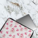 Infidu Cute Pink Heart Print Laptop Sleeve with pink heart pattern on white background, perfect for stylish laptop protection. The laptop sleeve covers the laptop