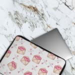 Infidu Cute Pink Envelope & Heart Laptop Sleeve with a white background and pink envelopes containing hearts, offering a playful and romantic design. The laptop sleeve covers the laptop