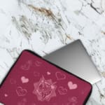 Infidu Romantic Dark Pink Heart Design Laptop Sleeve with intricate heart patterns and a couple of illustrations.