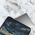 Infidu laptop sleeve with dreamy night sky design, featuring clouds and stars in dark blue and white tones. The laptop sleeve covers the laptop