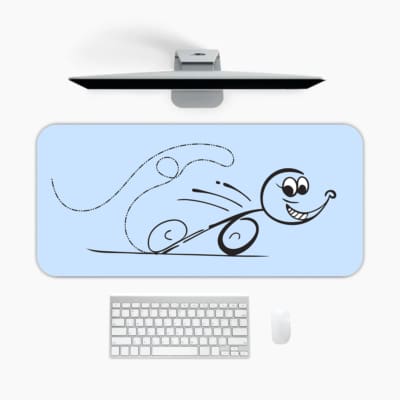 Infidu desk pad with cartoon character and playful swirl design on light blue background. A desk pad under the computer