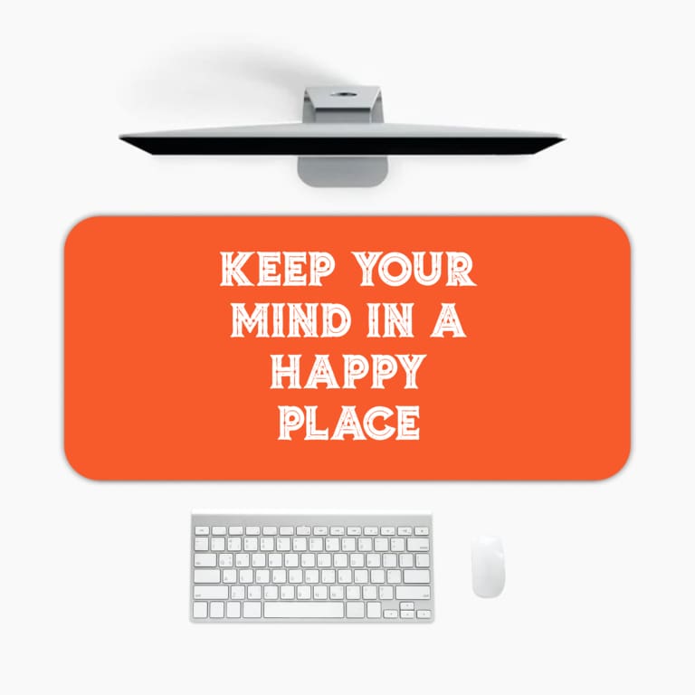 Infidu Keep Your Mind In A Happy Place Desk Pad with Motivational Orange Design A desk pad under the computer