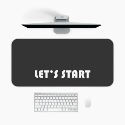 Infidu Let’s Start Desk Pad with white text on a black background, motivational design A desk pad under the computer