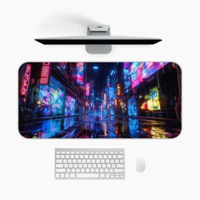 Infidu Futuristic City Desk Pad features a colorful scene with neon lights reflecting on a wet surface, perfect for a vibrant workspace. A desk pad under the computer