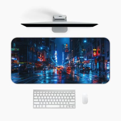 Infidu Neon Lights Midnight City Reflections Desk Pad shows a moody, rainy city scene with neon reflections, perfect for a modern workspace. A desk pad under the computer