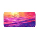 Infidu Calming Sunset Reflection Design Desk Pad featuring a sunset over water in soft shades of pink, purple, orange, and yellow. Desk Pad kept on a plain white background