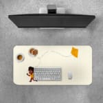 Infidu desk pad featuring a child flying an orange kite against a light sandal background. Desk Pad with Keyboard and Mouse on top of the desk pad