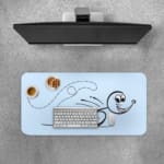 Infidu desk pad with cartoon character and playful swirl design on light blue background. Desk Pad with Keyboard and Mouse on top of the desk pad