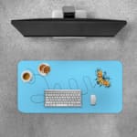 Infidu Yellow Butterfly Desk Pad featuring a yellow butterfly with a dotted flight path on a light background. Desk Pad with Keyboard and Mouse on top of the desk pad