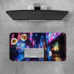 Infidu Futuristic City Desk Pad features a colorful scene with neon lights reflecting on a wet surface, perfect for a vibrant workspace. A desk pad under the computer