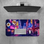 Infidu Neon City Street Desk Pad features a vibrant nighttime city scene with neon lights in pink, purple, yellow, and blue, perfect for any desk setup. A desk pad under the computer