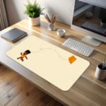 Infidu desk pad featuring a child flying an orange kite against a light sandal background. desk pad kept on the table