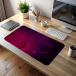 Infidu Desk Pad with a swirling marble design in shades of purple and pink, showcasing a smooth, flowing texture for a dreamy aesthetic. desk pad kept on the table